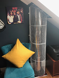 Aiano's designs and manufactures wire mesh flue guards for wood burning stoves